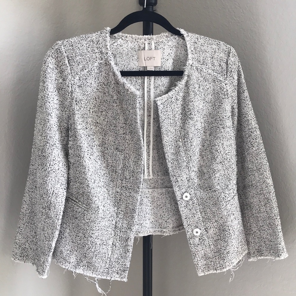 Speckled grey, black, and white jacket